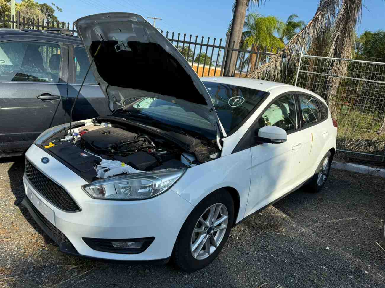 Damaged car awaiting removal in Brisbane